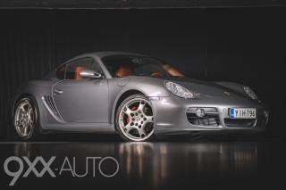 Harmaa Porsche Cayman