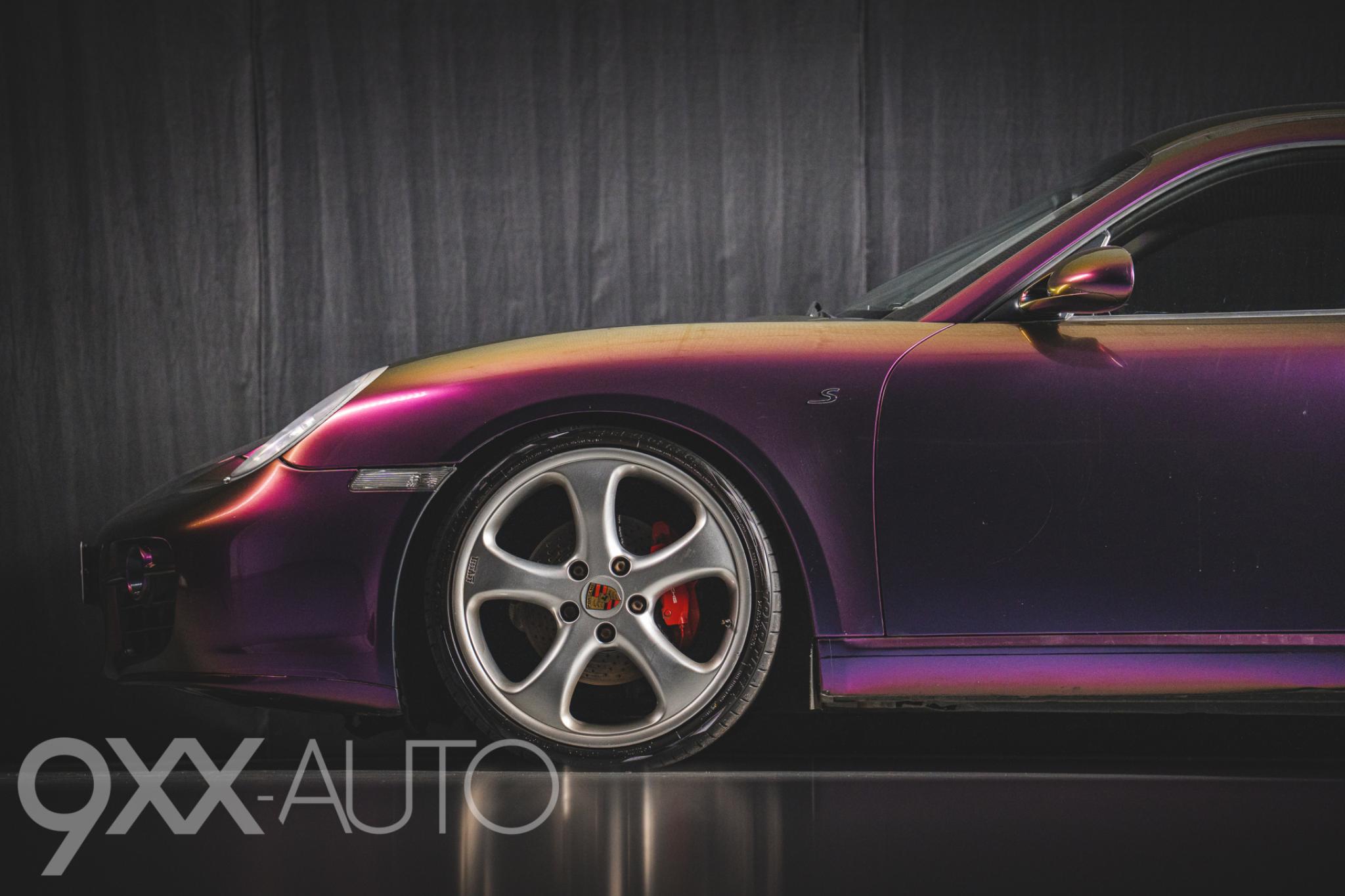 Musta Porsche Cayman S 3.4 Manuaali