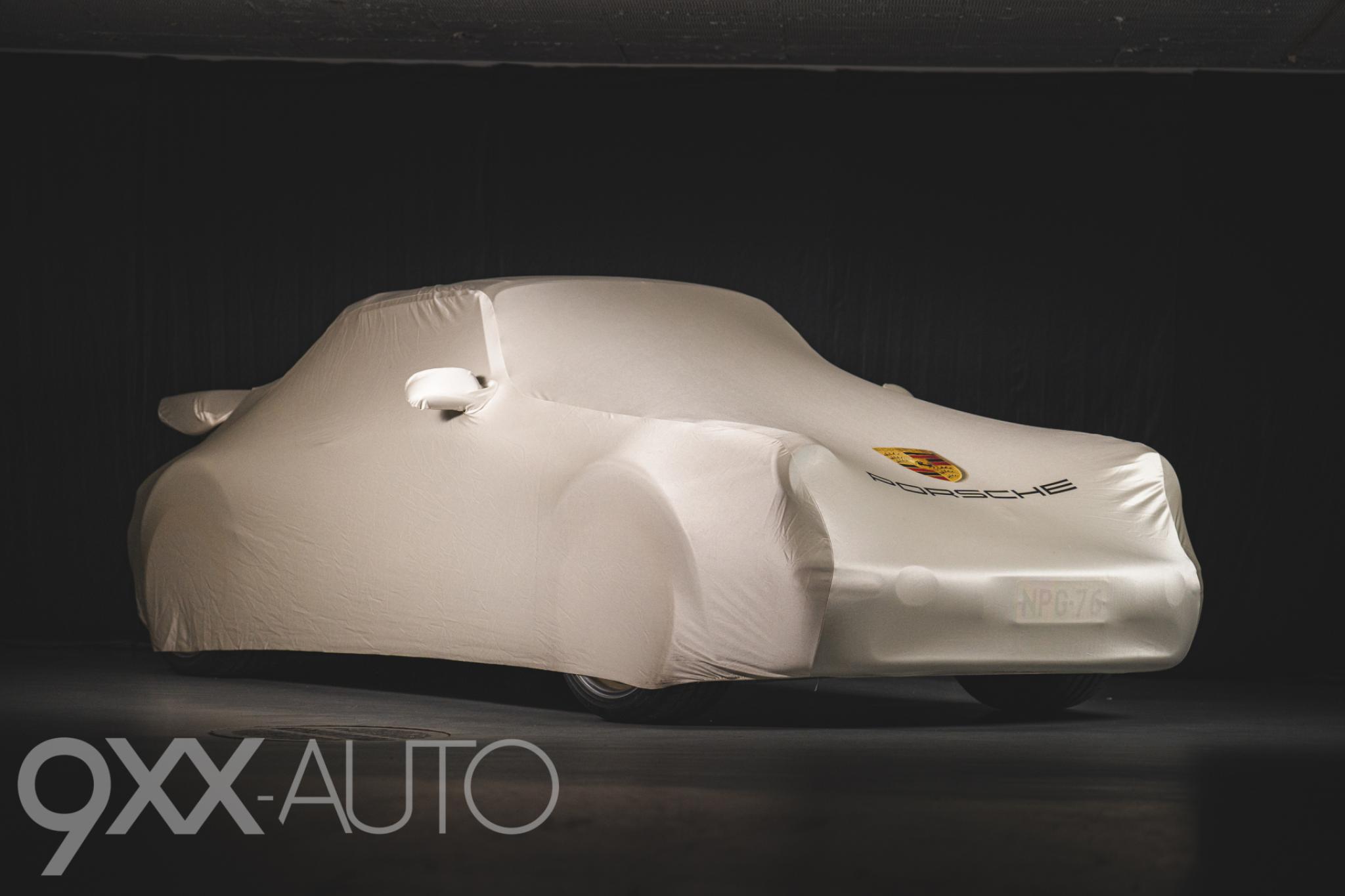 Sininen Porsche 911 Widebody Strosek