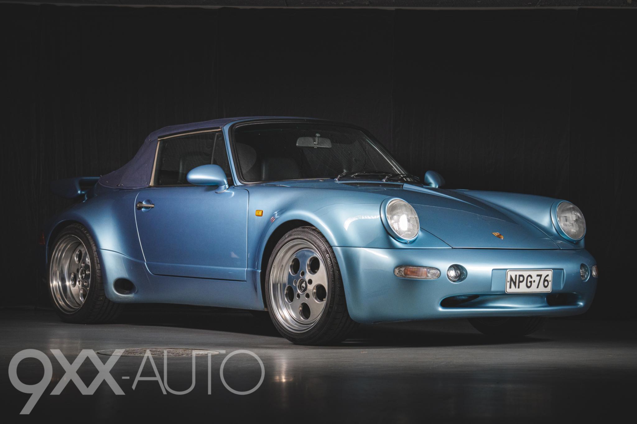 Sininen Porsche 911 Widebody Strosek