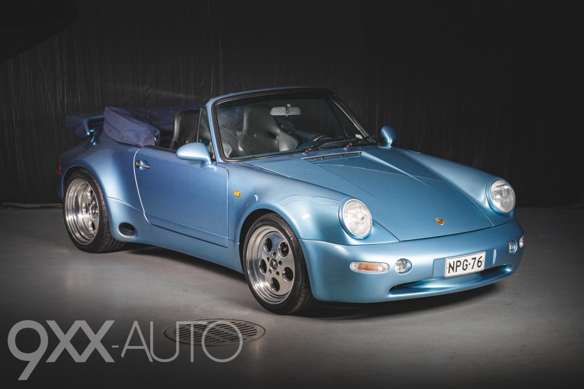 Sininen Porsche 911 Widebody Strosek