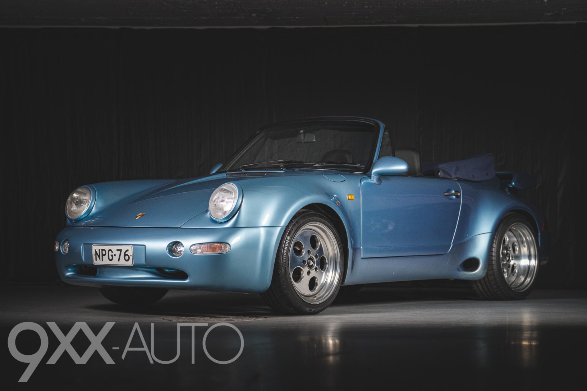 Sininen Porsche 911 Widebody Strosek