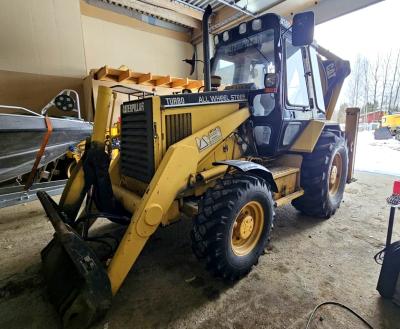 Cat 438B (1995)