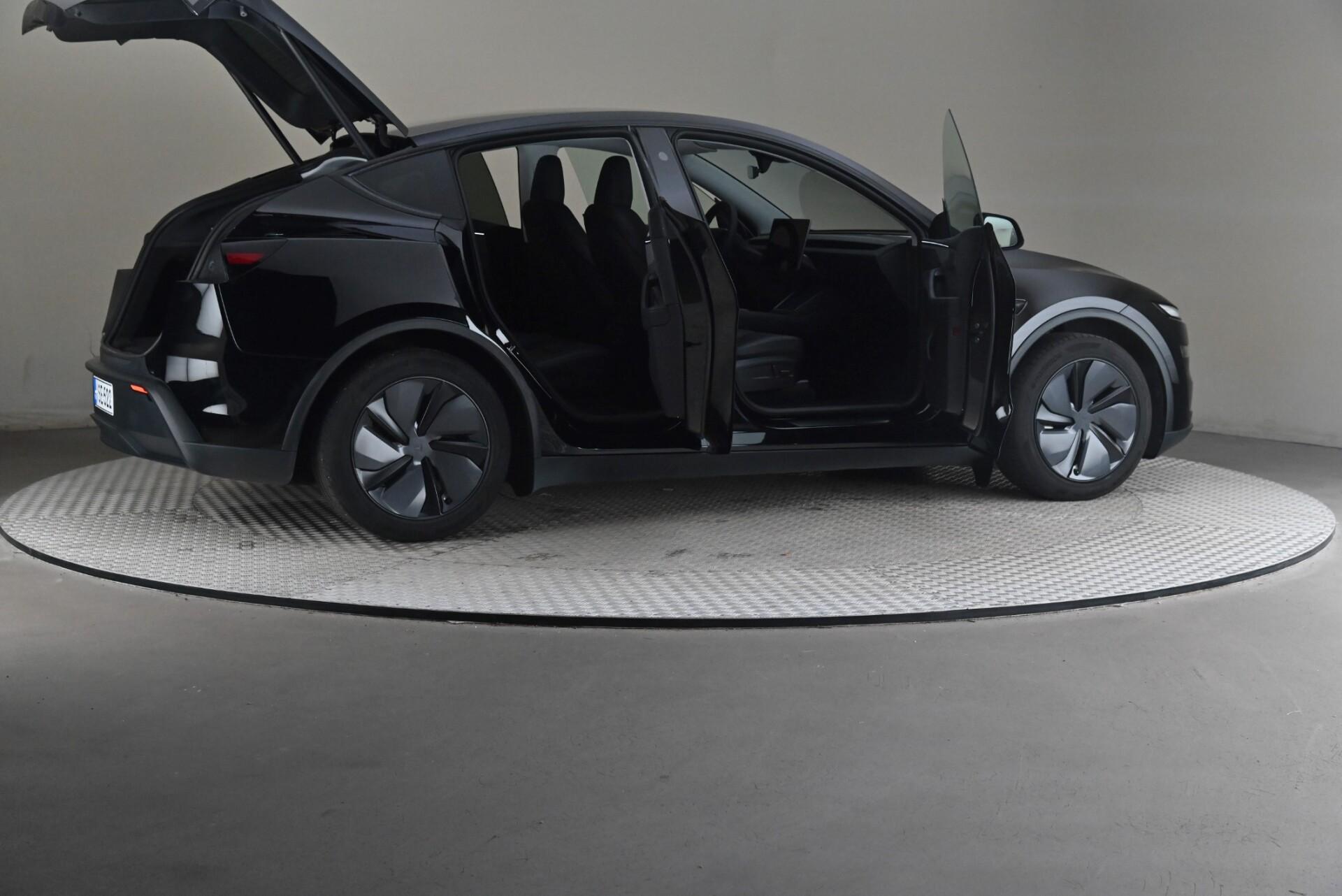 Tesla Model Y Long Range AWD 2025, bild 6/31