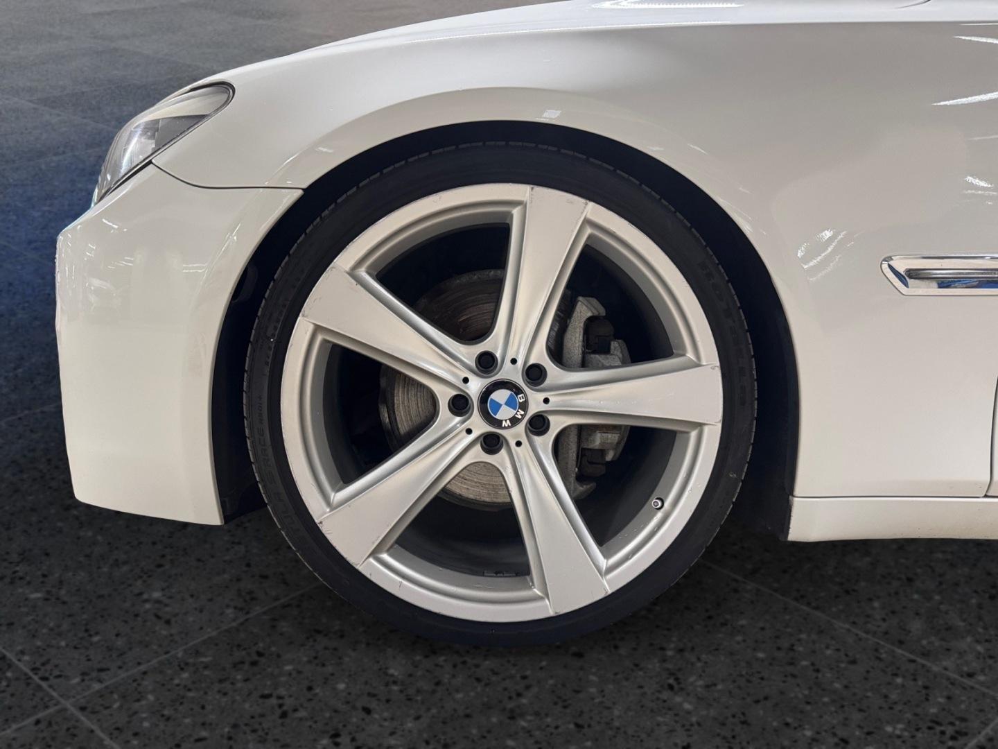 BMW 740 2011, kuva 7/23